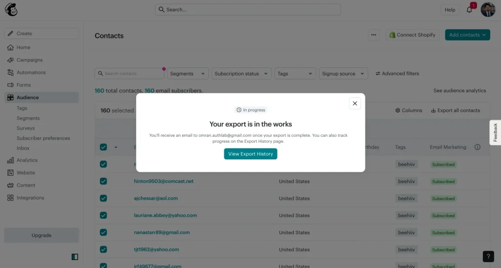 Mailchimp export progress message explaining that the account owner will receive an email when the contact export is complete.